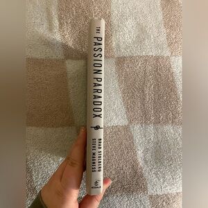 Passion Paradox by Brad Stulberg and Steve Magness in good condition